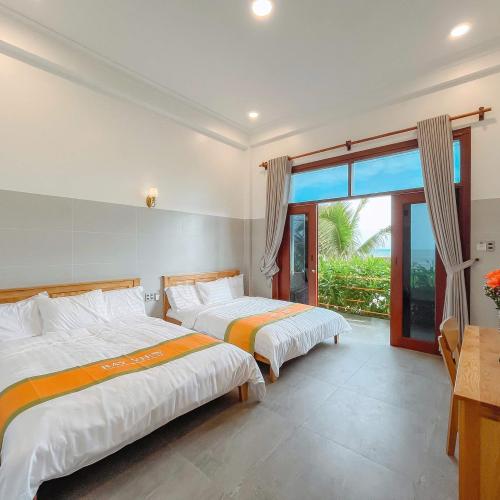 Deluxe Beach Front Twin Room - Pool & Seaview